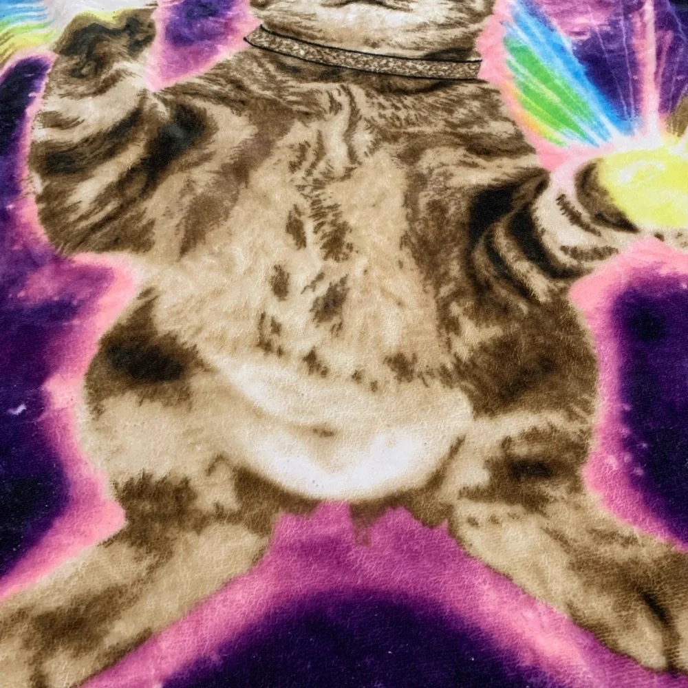 Throw blanket with cat on it